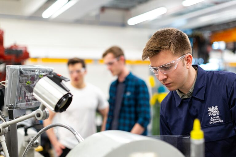 Engineer checking measuring equipment during calibration